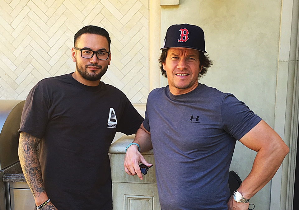 Chef Lawrence Duran cooking for the Wahlbergs